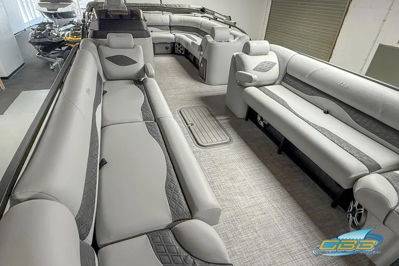 Slide: The Image of 2026 JC 25 Neptoon LG pontoon boat interior with luxurious seating and modern design. - 55