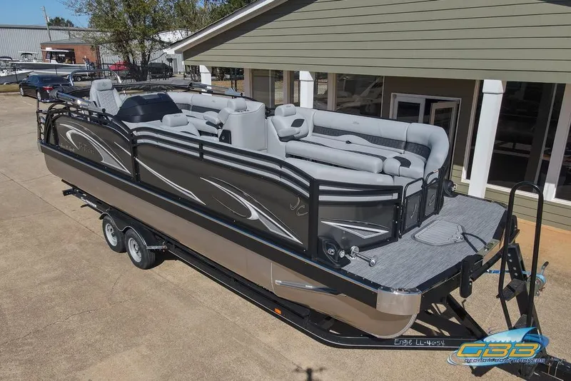 Slide: The Image of 2026 JC 25 Neptoon LG pontoon boat with spacious seating and modern dashboard. - 13