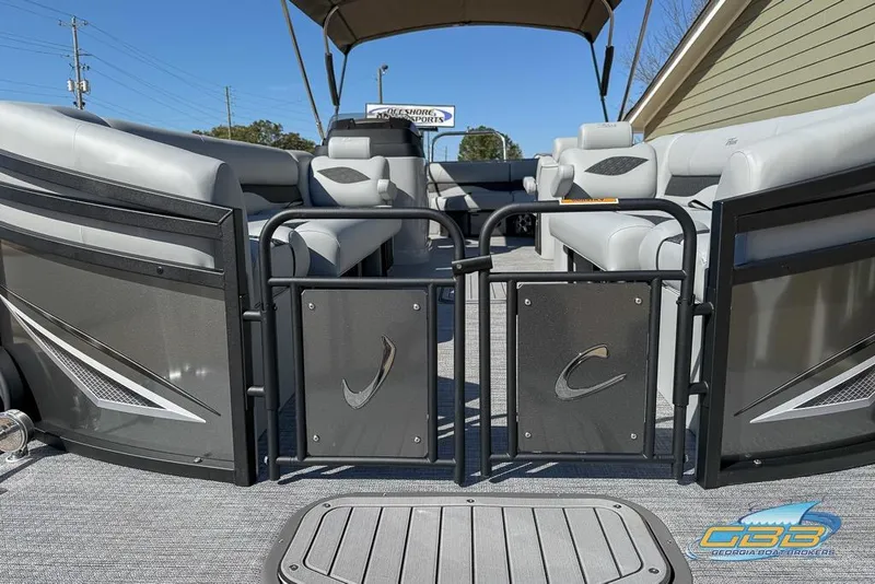 Slide: The Image of Luxurious seating on 2026 JC 25 Neptoon LG pontoon boat, featuring elegant gray upholstery. - 37