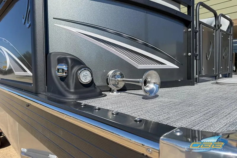 Slide: The Image of 2026 JC 25 Neptoon LG pontoon boat with luxurious gray seating and modern design. - 38