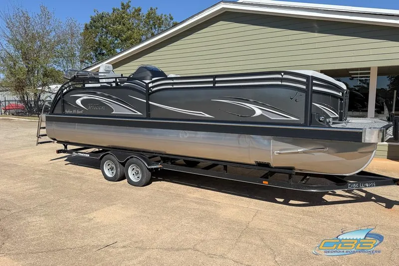 Slide: The Image of 2026 JC 25 Neptoon LG pontoon boat with sleek design and Tritoon branding. - 49