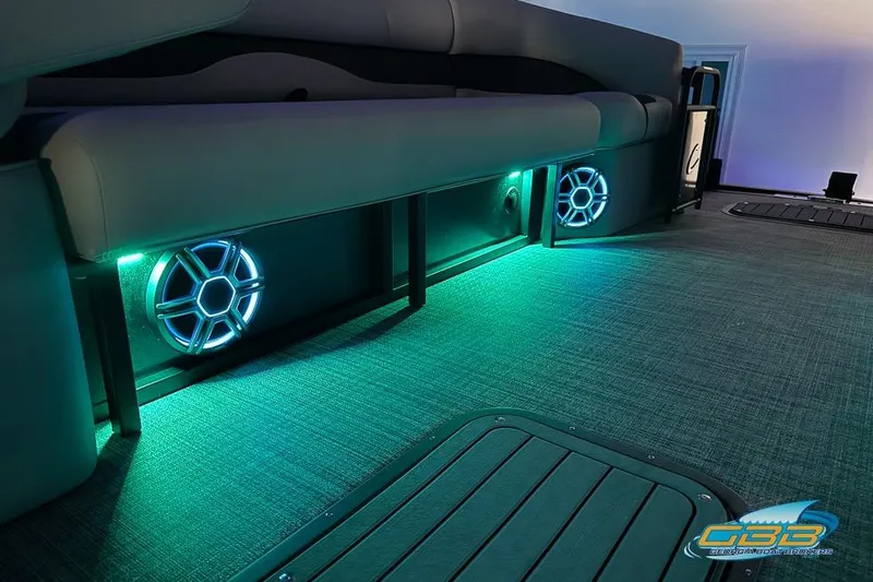 Slide: The Image of 2026 JC 25 Neptoon LG boat interior with illuminated speakers and seating. - 66