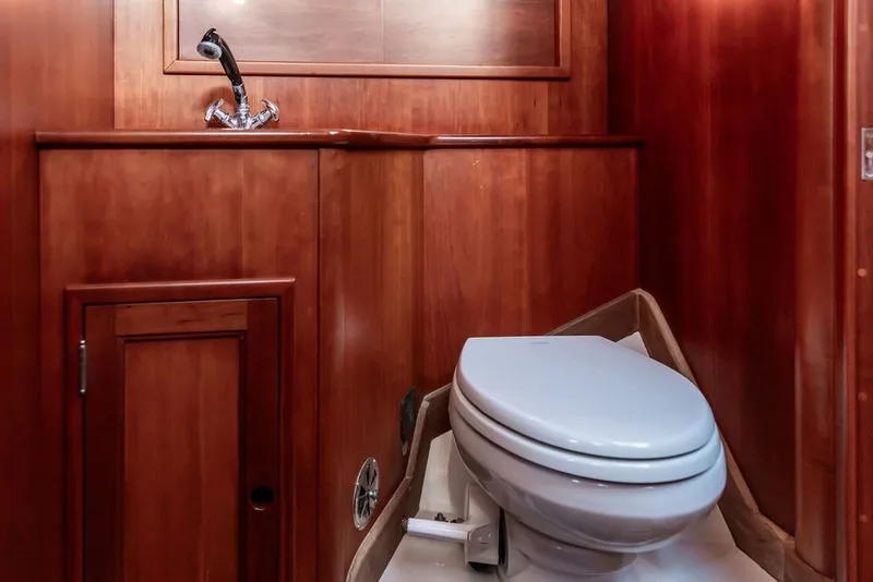 Slide: The Image of Luxurious wooden bathroom interior on a 1994 Hinckley Sou'wester 42 yacht. - 25