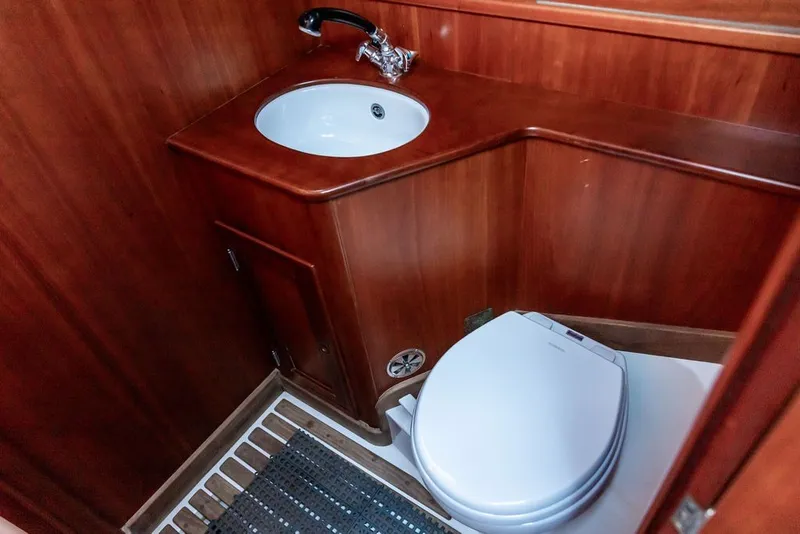 Slide: The Image of Luxurious wooden bathroom interior on 1994 Hinckley Sou'wester 42 yacht. - 24