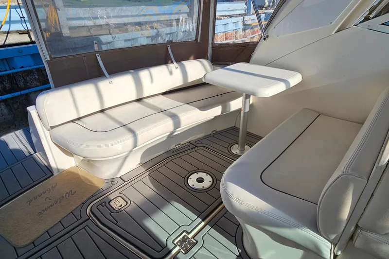 Slide: The Image of 2006 Cruisers Yachts 300 Express interior with sink and mini fridge. - 10
