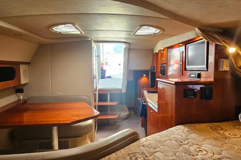 Slide: The Image of Control panel on 2006 Cruisers Yachts 300 Express, featuring SMXir display and operation instructions. - 27