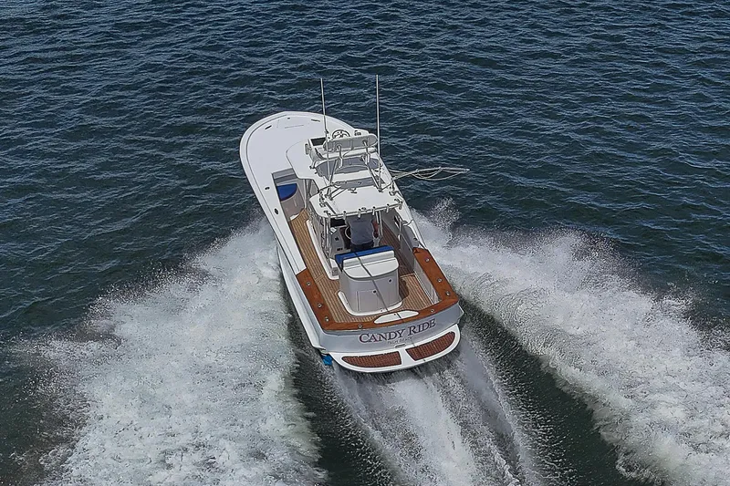 Slide: The Image of Aerial view of 2011 Winter Custom Yachts 29 boat cruising on open water. - 4