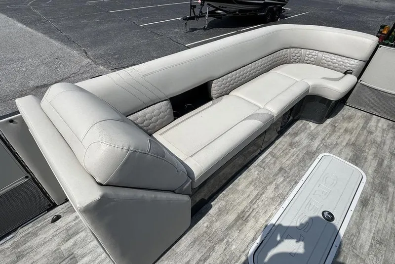 Slide: The Image of 2021 Crest Caribbean Platinum 250 SLS boat interior with luxurious seating and modern design. - 10