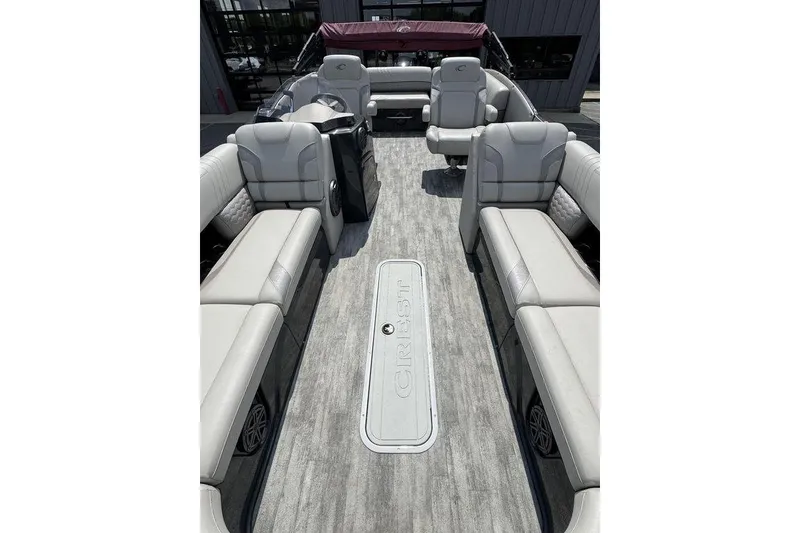 Slide: The Image of 2021 Crest Caribbean Platinum 250 SLS boat interior with luxurious seating and modern design. - 12