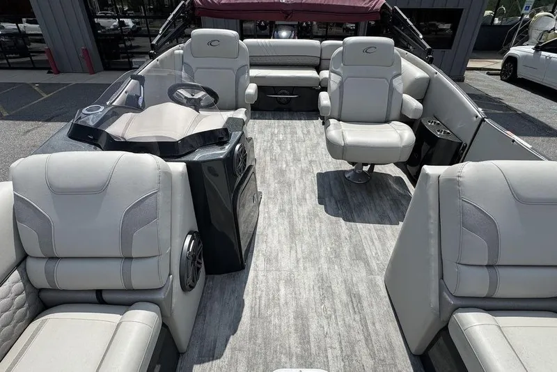 Slide: The Image of 2021 Crest Caribbean Platinum 250 SLS boat interior with luxurious seating and modern design. - 15