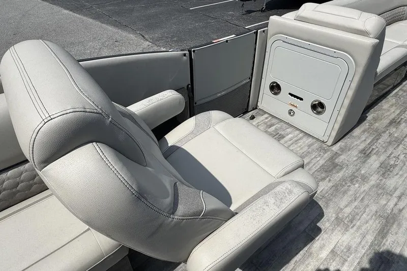 Slide: The Image of 2021 Crest Caribbean Platinum 250 SLS boat interior with luxurious seating and modern design. - 17