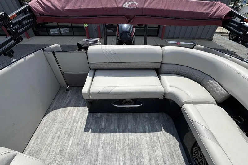 Slide: The Image of 2021 Crest Caribbean Platinum 250 SLS boat interior with plush seating and modern design. - 18