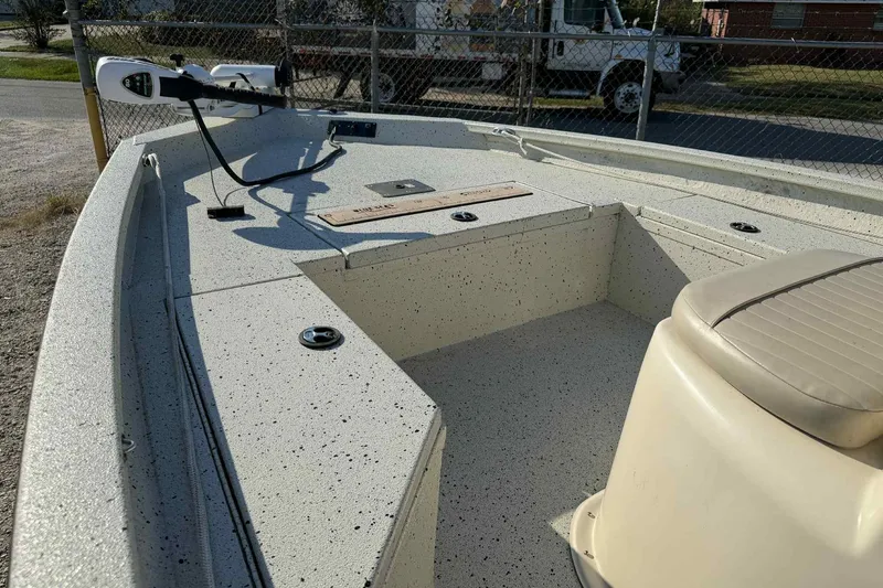 Slide: The Image of 2016 Xpress H20B Bay boat interior with seating and equipment. - 7