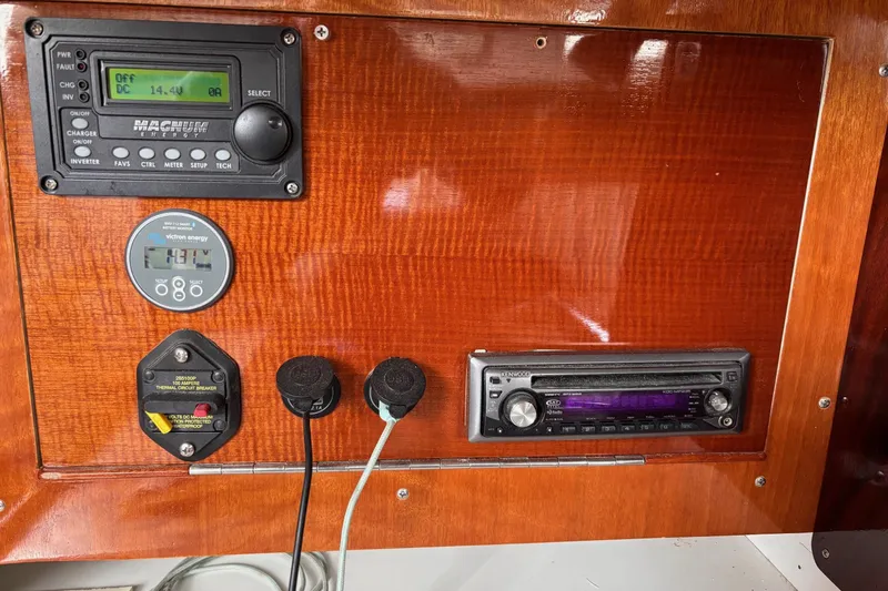 Slide: The Image of Control panel of a 1993 J Boats J/130 with electronic displays and audio system. - 20