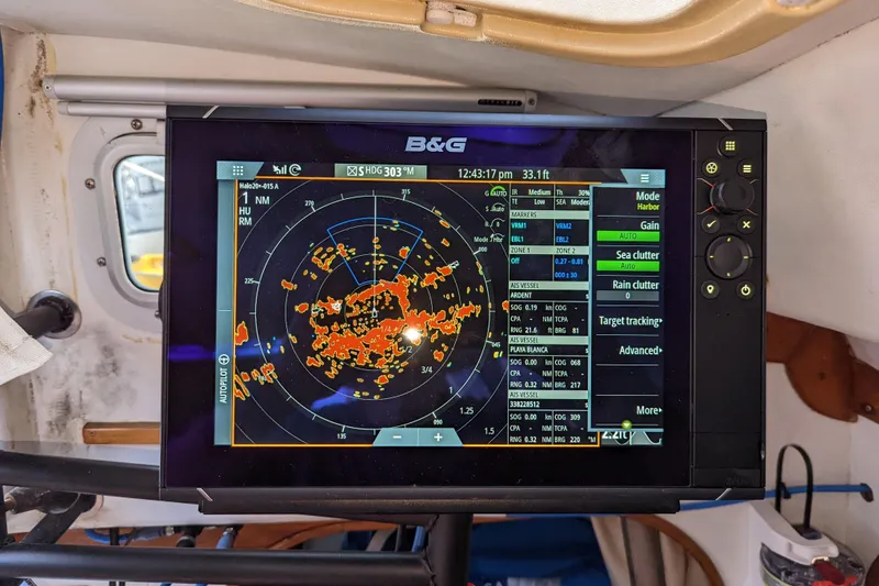 Slide: The Image of B&G radar display on 1993 J Boats J/130 sailboat, showing navigation data. - 23