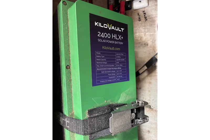 Slide: The Image of Kilovault 2400 HLX+ solar power battery installed on J Boats J/130, 1993 model. - 42