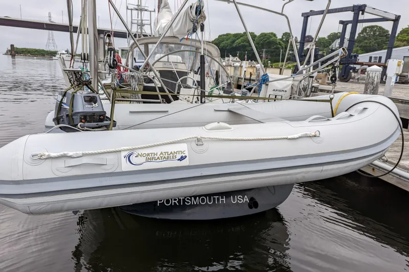 Slide: The Image of 1993 J Boats J/130 with inflatable dinghy, docked in Portsmouth, USA. - 7