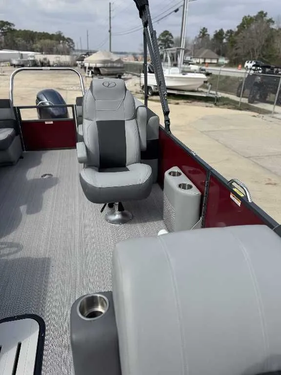 Slide: The Image of Interior of a 2023 Veranda VR20RC boat with gray seating. - 13
