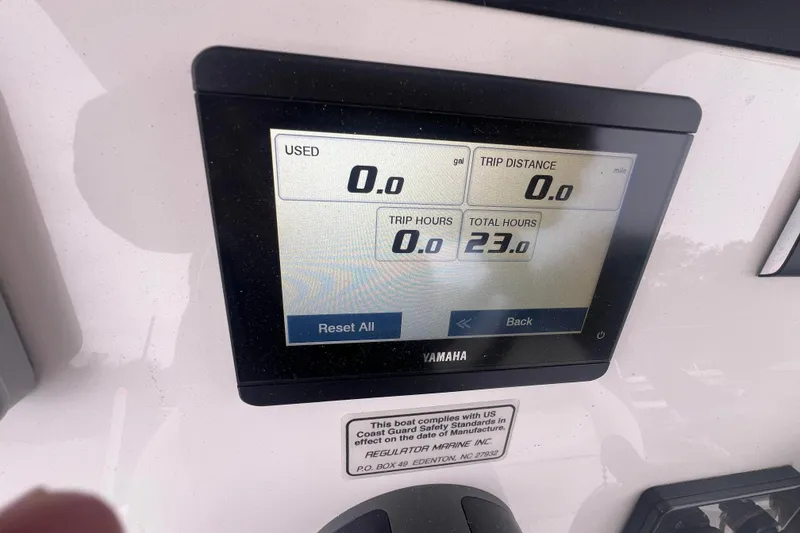 Slide: The Image of Yamaha display on 2024 Regulator 26XO showing trip and total hours. - 10