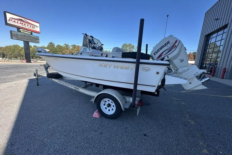 Slide: The Image of 2011 Key West 176 Bay Reef boat on trailer, parked outside Palmetto Boat Center. - 8