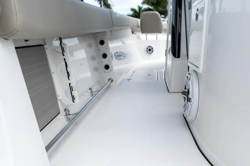 Slide: The Image of 2025 Sportsman Open 322 Center Console interior with seating and storage features. - 10