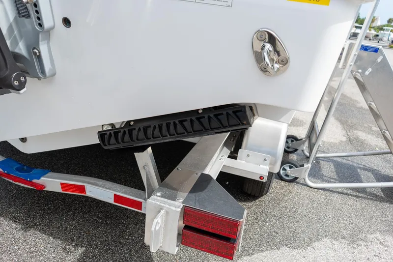 Slide: The Image of 2025 Sportsman Open 322 Center Console boat on trailer, rear view detail. - 17