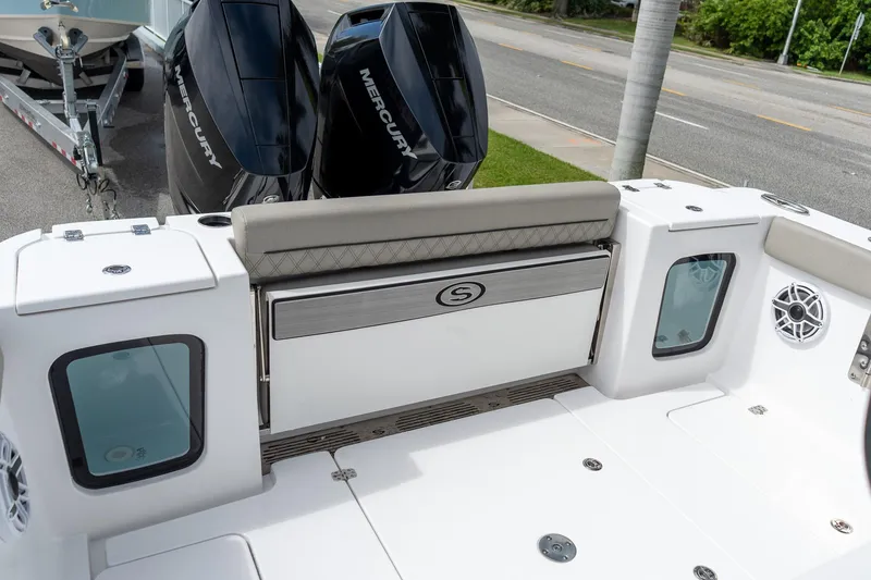 Slide: The Image of 2025 Sportsman Open 322 Center Console boat with dual Mercury engines. - 22