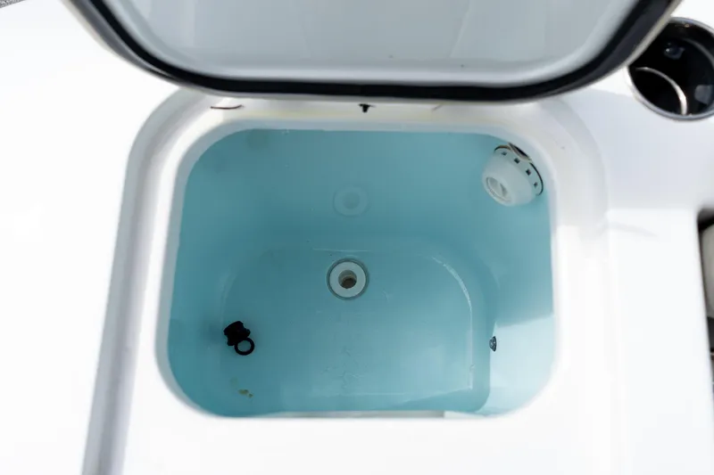 Slide: The Image of Open livewell on 2025 Sportsman Open 322 Center Console boat. - 24