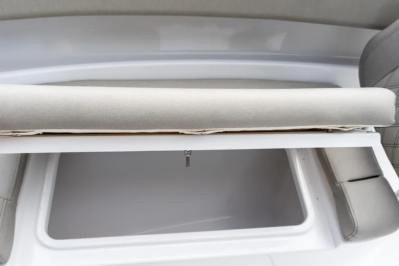 Slide: The Image of 2025 Sportsman Open 322 Center Console boat seat with storage compartment. - 45