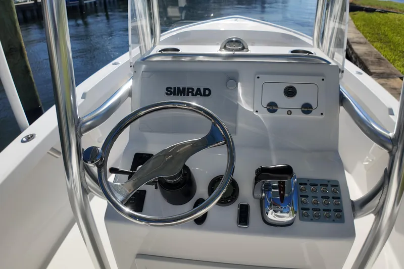 Slide: The Image of 2016 Albury Brothers 23 boat console with Simrad electronics and Suzuki controls. - 11