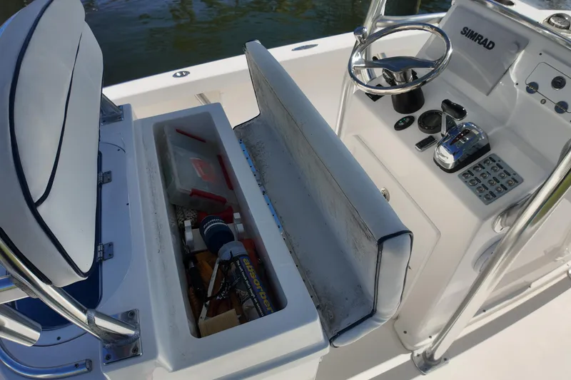 Slide: The Image of 2016 Albury Brothers 23 boat console with storage and Simrad navigation system. - 17