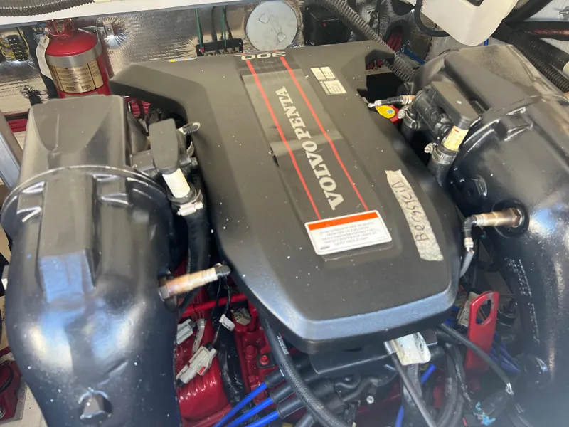 Slide: The Image of Volvo Penta engine in a 2013 Regal 3200 Bowrider boat. - 26