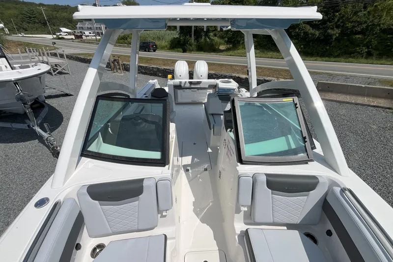 Slide: The Image of 2026 Robalo R257 Dual Console boat with spacious seating and modern design. - 17