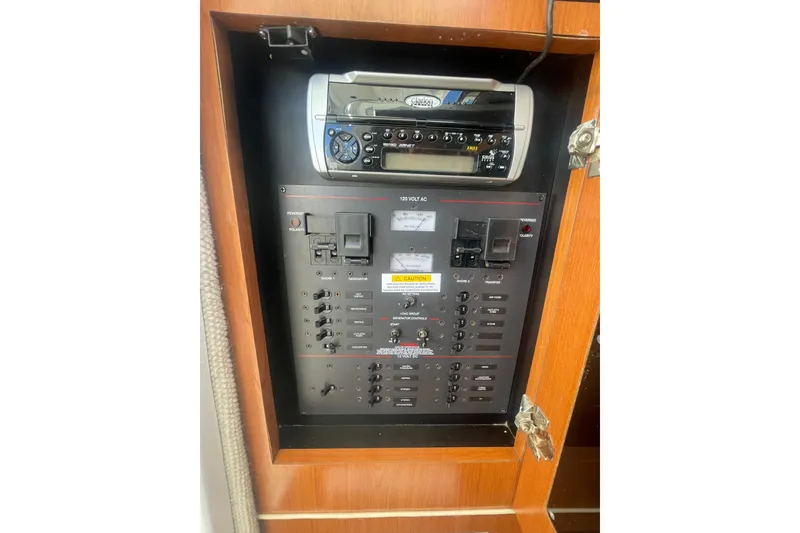 Slide: The Image of Electrical panel and stereo system in 2005 Wellcraft 290 Coastal boat. - 23