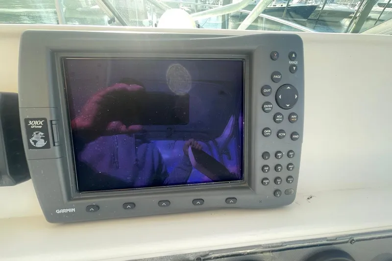 Slide: The Image of Garmin GPSmap 3010C on 2005 Wellcraft 290 Coastal boat dashboard. - 33