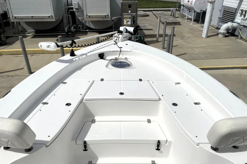 Slide: The Image of 2019 Blue Wave 2800 Pure Hybrid boat deck with storage compartments and seating. - 21