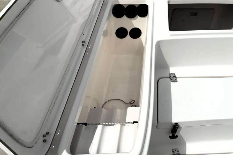 Slide: The Image of 2019 Blue Wave 2800 Pure Hybrid boat storage compartments, open and empty. - 29