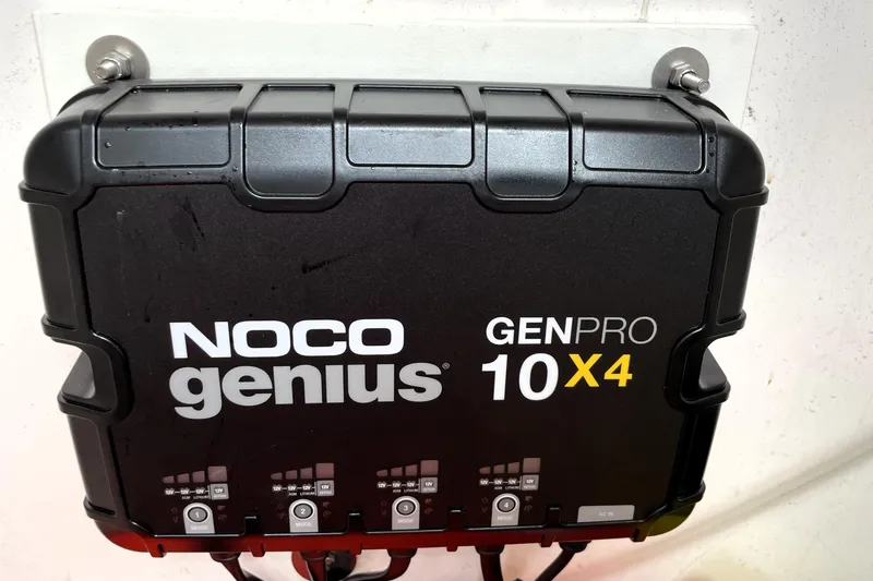 Slide: The Image of NOCO Genius GENPRO 10X4 battery charger mounted on a wall, 2019 Blue Wave 2800 Pure Hybrid. - 42