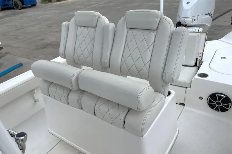 Slide: The Image of Luxurious seating on 2019 Blue Wave 2800 Pure Hybrid boat, featuring diamond-stitched upholstery. - 43