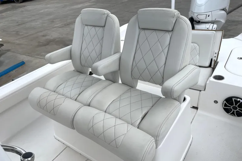 Slide: The Image of Luxurious seating on 2019 Blue Wave 2800 Pure Hybrid boat, featuring diamond-stitched upholstery. - 44