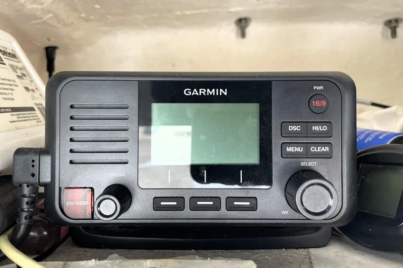 Slide: The Image of Garmin marine radio on 2019 Blue Wave 2800 Pure Hybrid boat dashboard. - 51