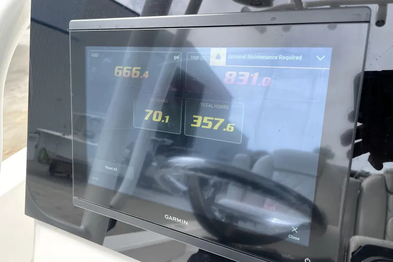 Slide: The Image of Garmin display on 2019 Blue Wave 2800 Pure Hybrid showing fuel usage and maintenance data. - 63