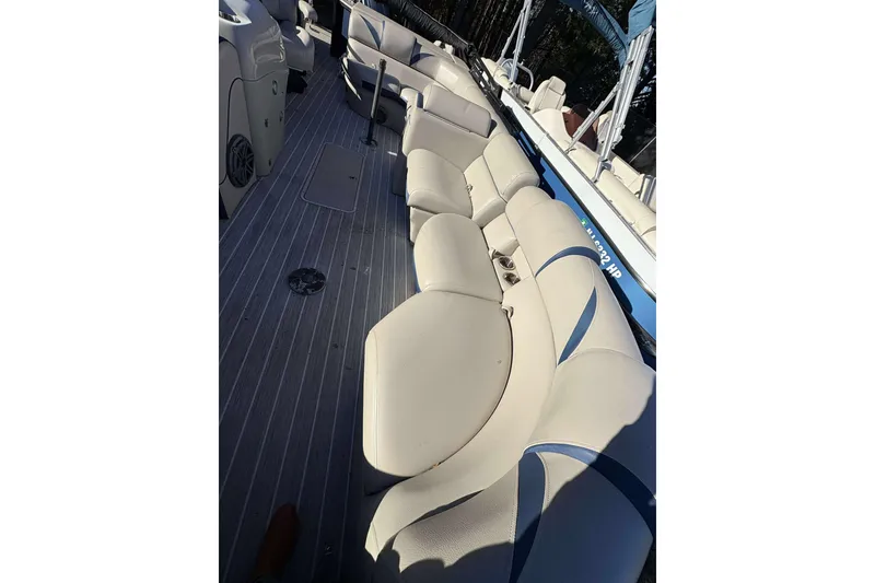 Slide: The Image of 2017 Berkshire 23 boat interior with spacious seating and modern design. - 24