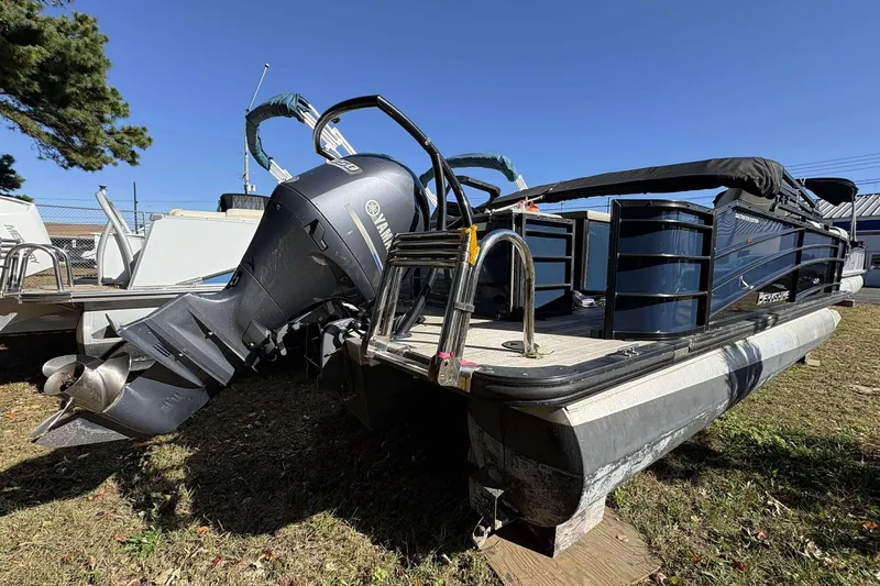 Slide: The Image of 2017 Berkshire 23 pontoon boat with Yamaha outboard motor on grass. - 3