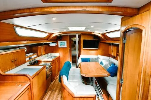 Slide: The Image of Deck view of 1999 Jeanneau Sun Odyssey 42.2 sailboat with rigging details. - 14