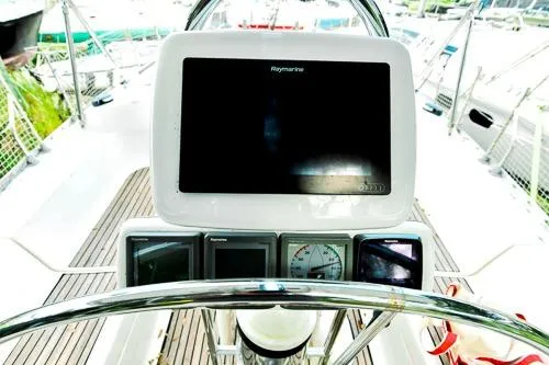 Slide: The Image of Cockpit of 1999 Jeanneau Sun Odyssey 42.2 sailboat with ocean view. - 6