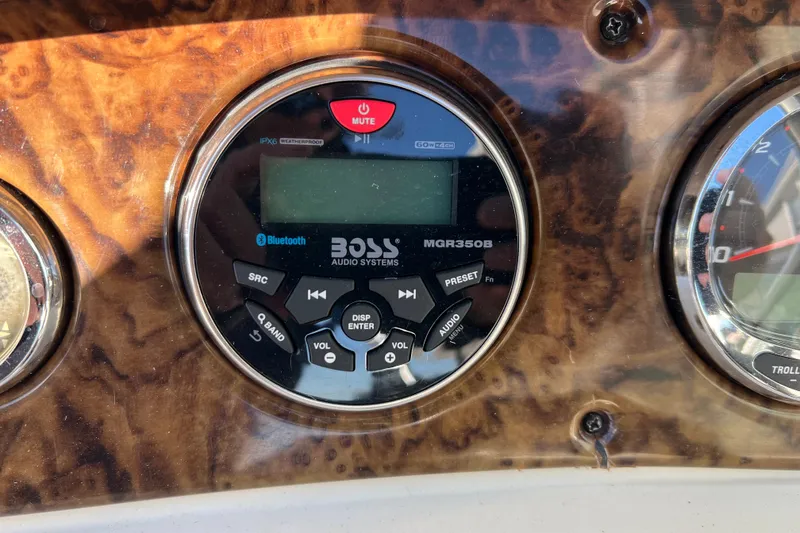 Slide: The Image of Boss Audio Systems MGR350B on 2004 Sea Ray 240 Sundeck dashboard. - 18