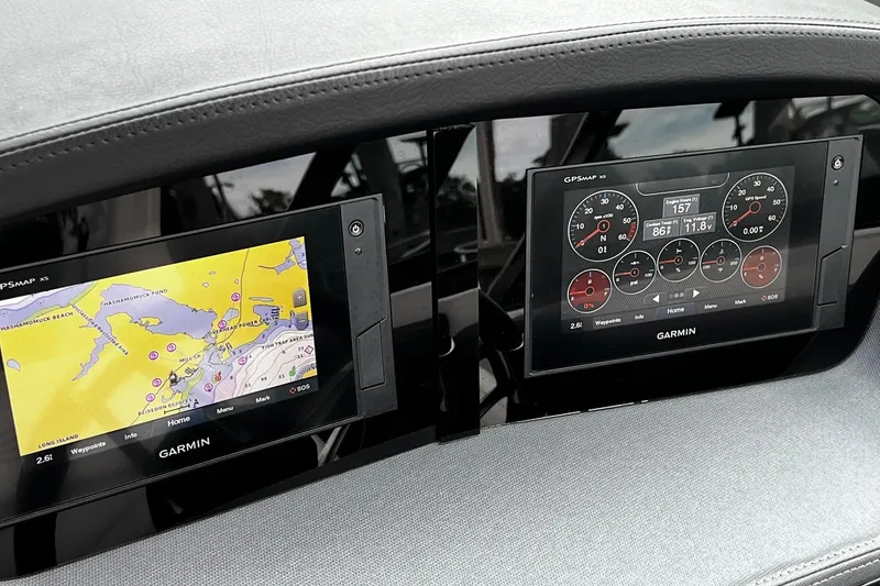 Slide: The Image of Dashboard of 2020 Chaparral 297 SSX with Garmin navigation and control displays. - 20