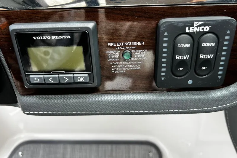 Slide: The Image of Control panel of 2020 Chaparral 297 SSX boat with Volvo Penta and Lenco systems. - 27
