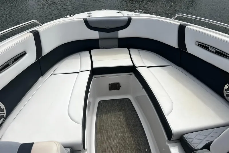 Slide: The Image of 2020 Chaparral 297 SSX boat interior with white and black seating. - 31